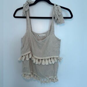 The impeccable pig tassle tank top